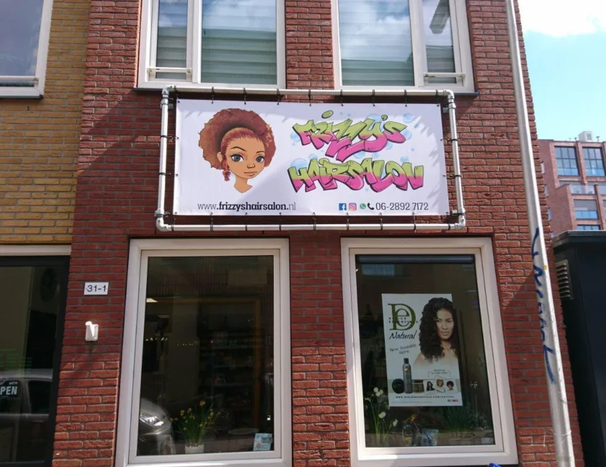 Frizzy Hairsalon kapper afro Enschede - Uit in Enschede